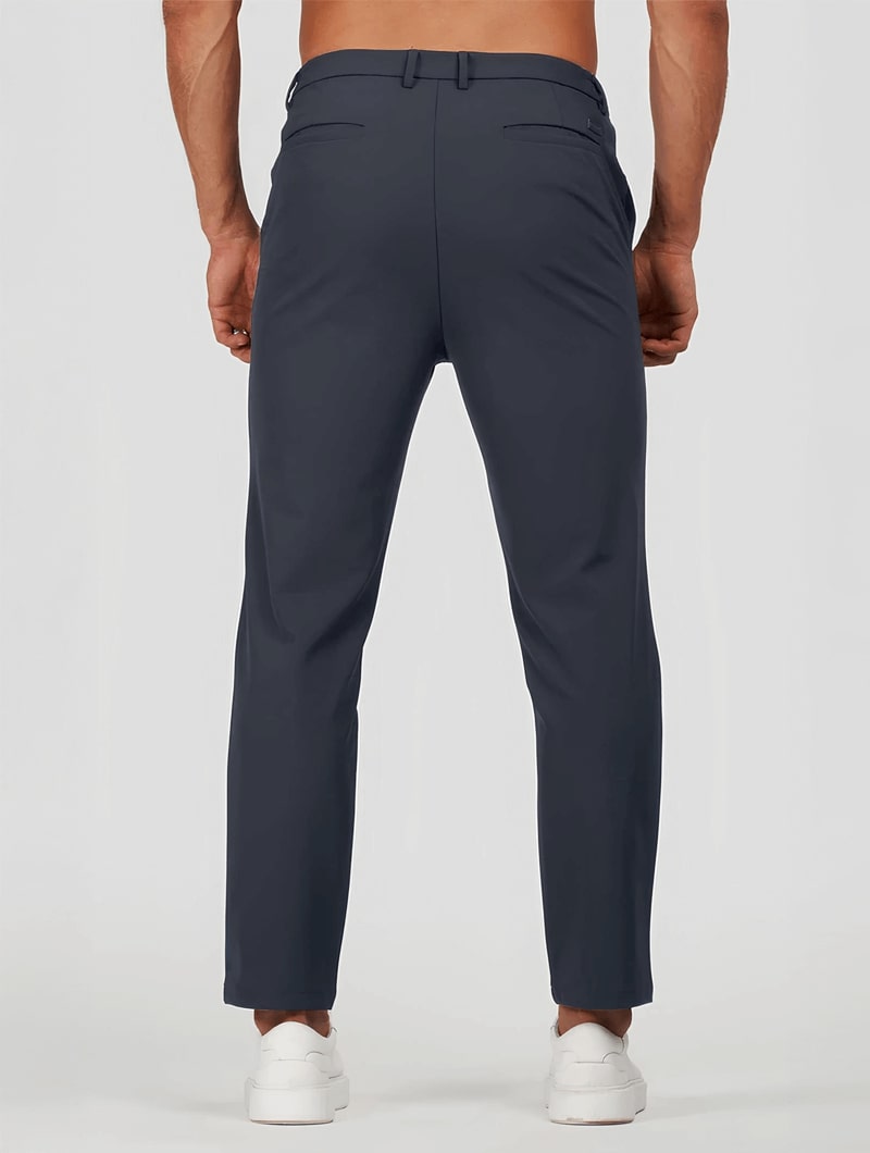 Men's Elastic Stretch Slim Fit Trousers in Navy Blue – back view | Hensley London