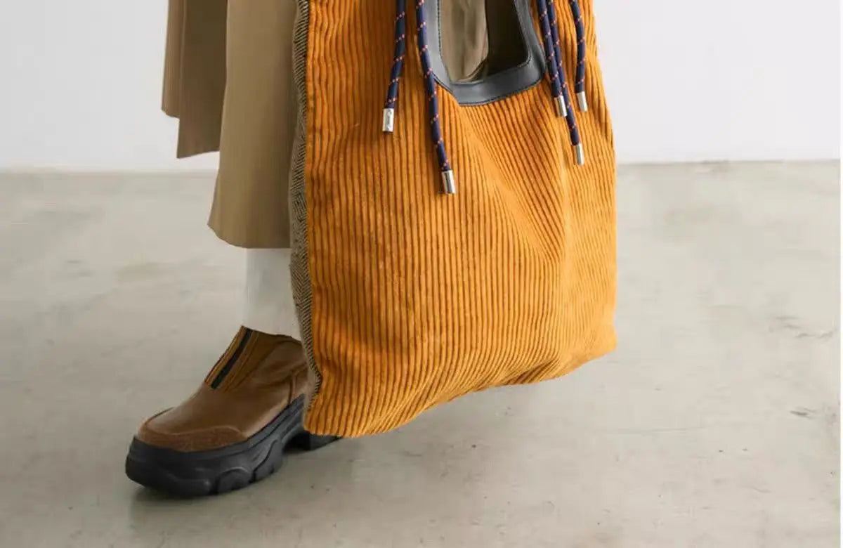 Women's Ribbed Carry-All Tote with Rope-Style Handles in Yellow – product view | Hensley London
