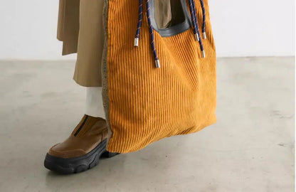 Women's Ribbed Carry-All Tote with Rope-Style Handles in Yellow – product view | Hensley London