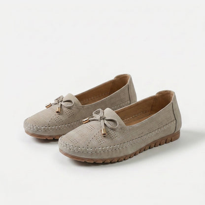 Women's Soft Comfort Bow Loafers in Beige – styled view | Hensley London