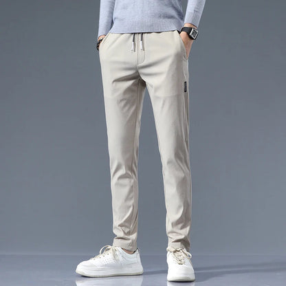 Men's Cotton Blend Slim Fit Trousers in Khaki – front view | Hensley London