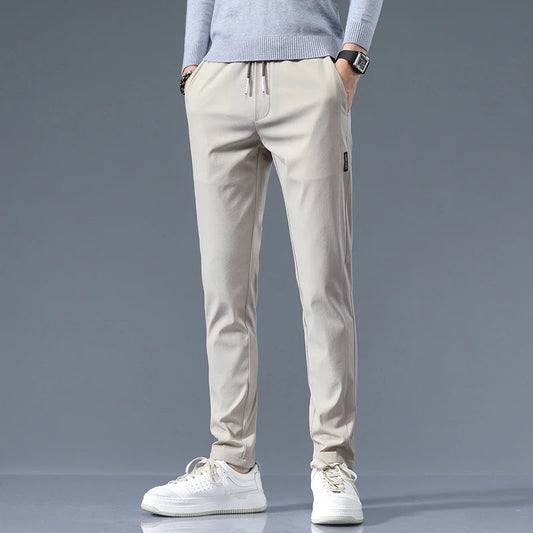 Men's Cotton Blend Slim Fit Trousers in Khaki – front view | Hensley London