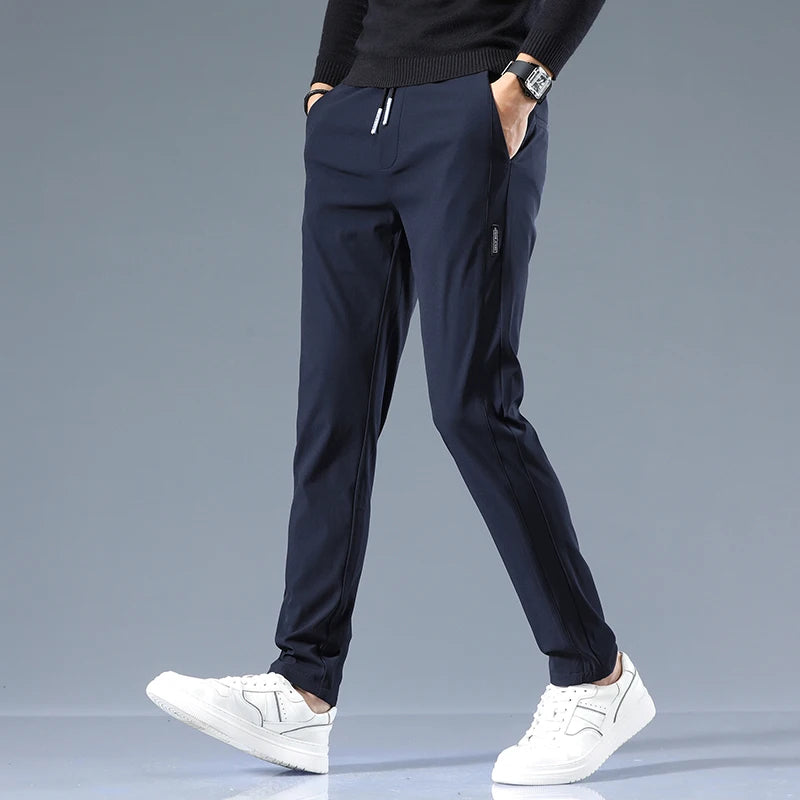 Men's Cotton Blend Slim Fit Trousers – side view | Hensley London