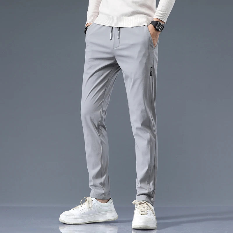 Men's Cotton Blend Slim Fit Trousers – back view | Hensley London
