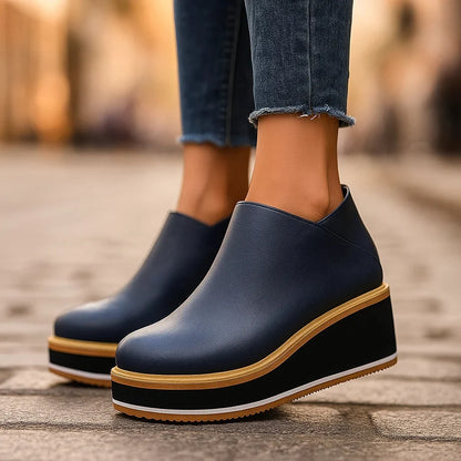 Women's Faux Leather Side-Zip Wedge Ankle Boots in Deep Blue – Product view | Hensley London