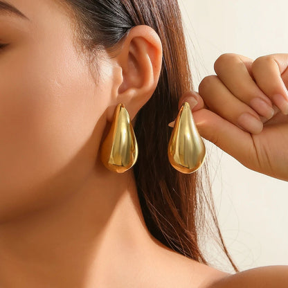 Statement Water Drop Earrings in Gold and Silver – Minimalist Stud Design 0