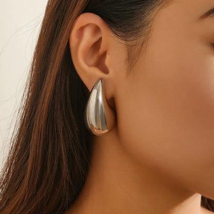 Statement Water Drop Earrings in Gold and Silver – Minimalist Stud Design 4
