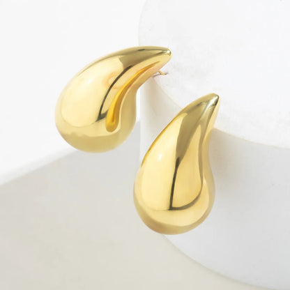 Statement Water Drop Earrings in Gold and Silver – Minimalist Stud Design 7