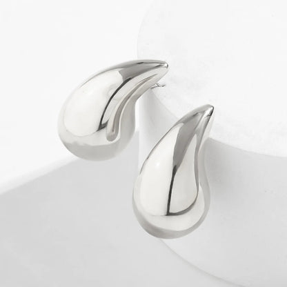 Statement Water Drop Earrings in Gold and Silver – Minimalist Stud Design 8