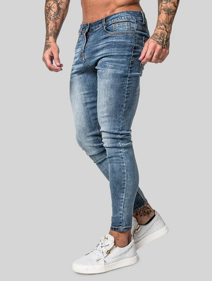 Men's Slim-Fit Stretch Jeans in Blue – side view | Hensley London