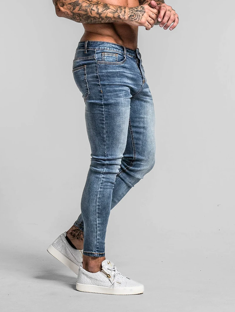 Men's Slim-Fit Stretch Jeans in Blue – back view | Hensley London