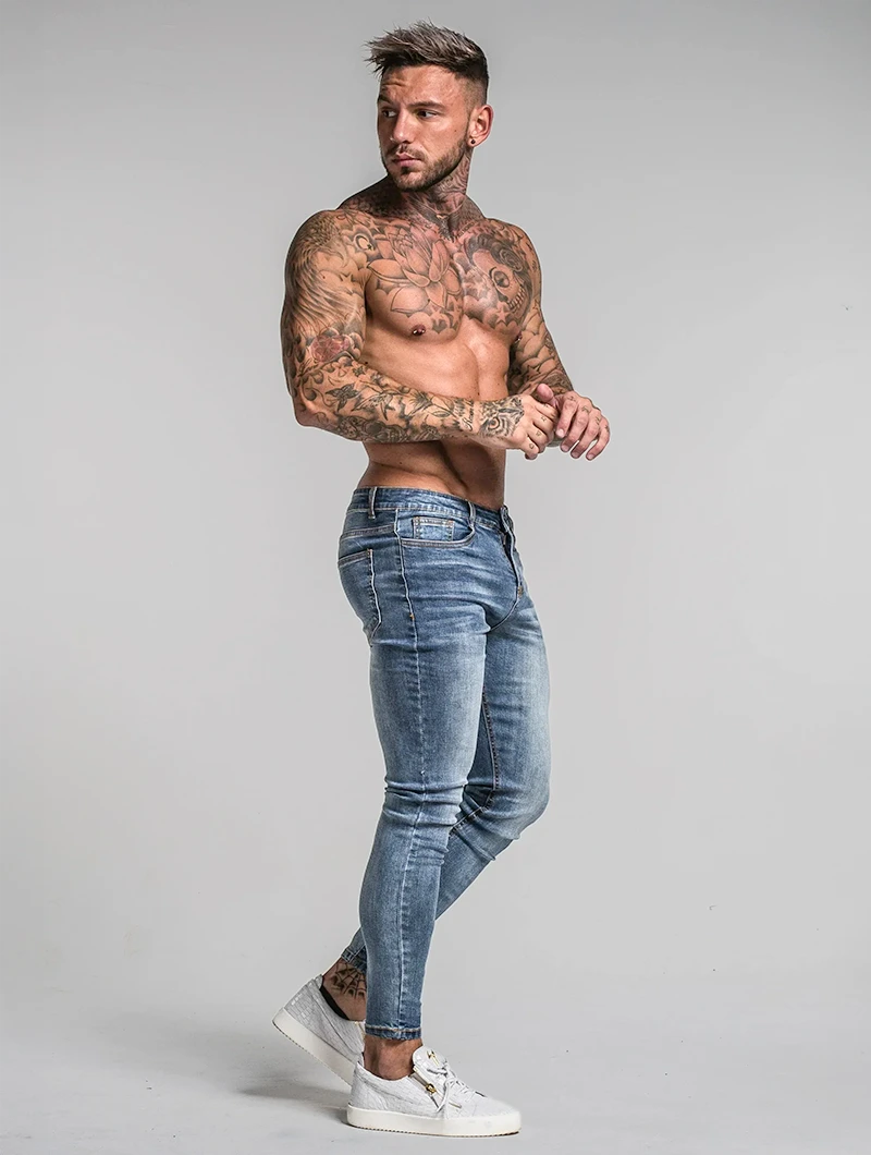 Men's Slim-Fit Stretch Jeans in Blue – styled view | Hensley London