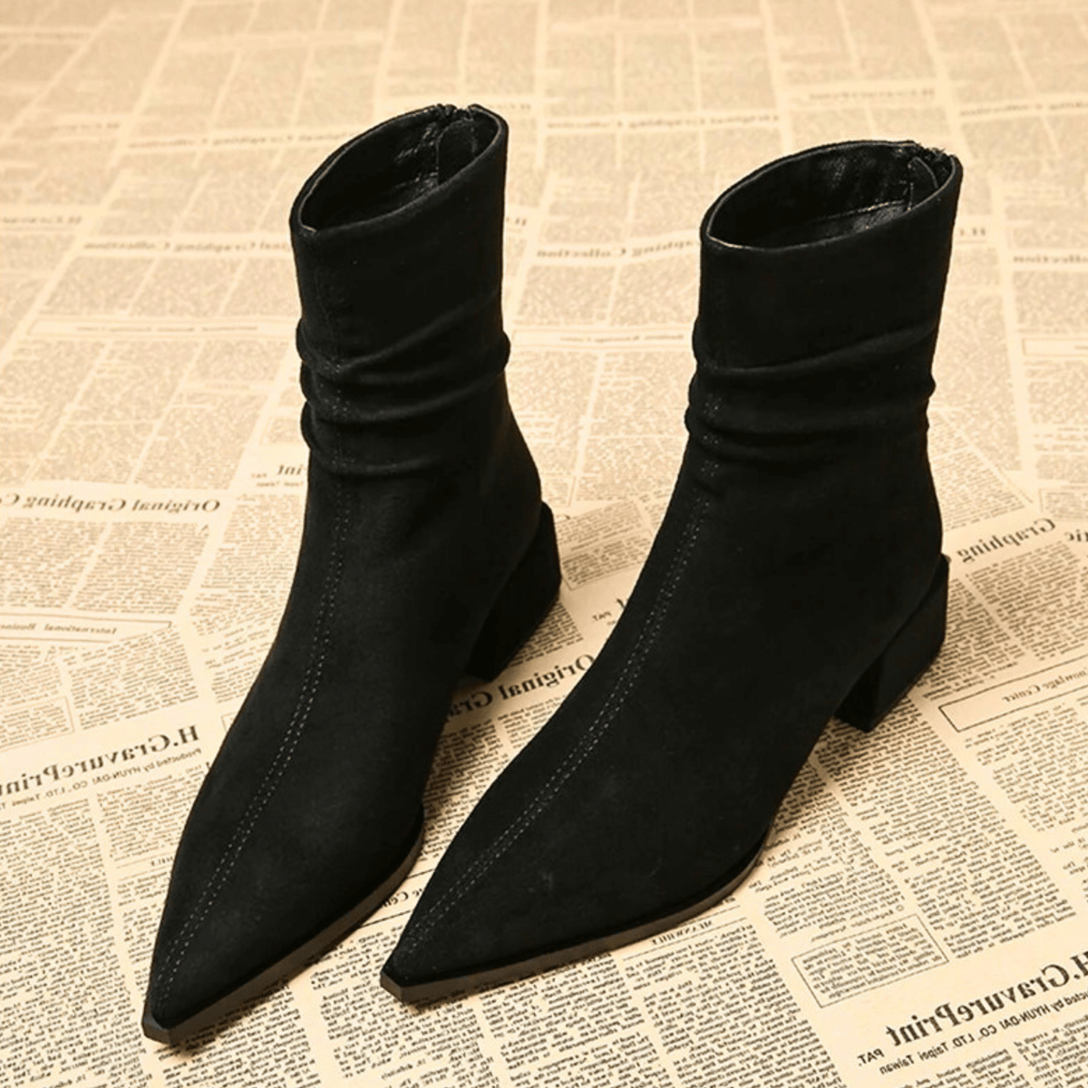 Women's Pointed-Toe Slouch Ankle Boots in Black - product view | Hensley London