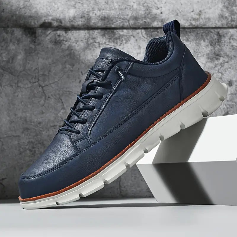 Men's Leather Low-Top Sneakers in Black – front view | Hensley London