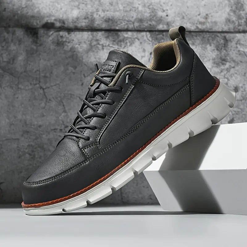 Men's Leather Low-Top Sneakers in Blue – side view | Hensley London
