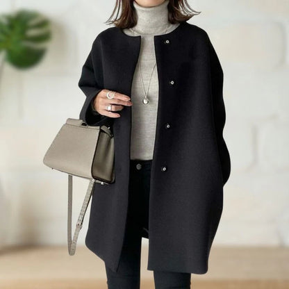 Women's Collarless Button-Front Mid-Length Coat in Black – product view 1 | Hensley London