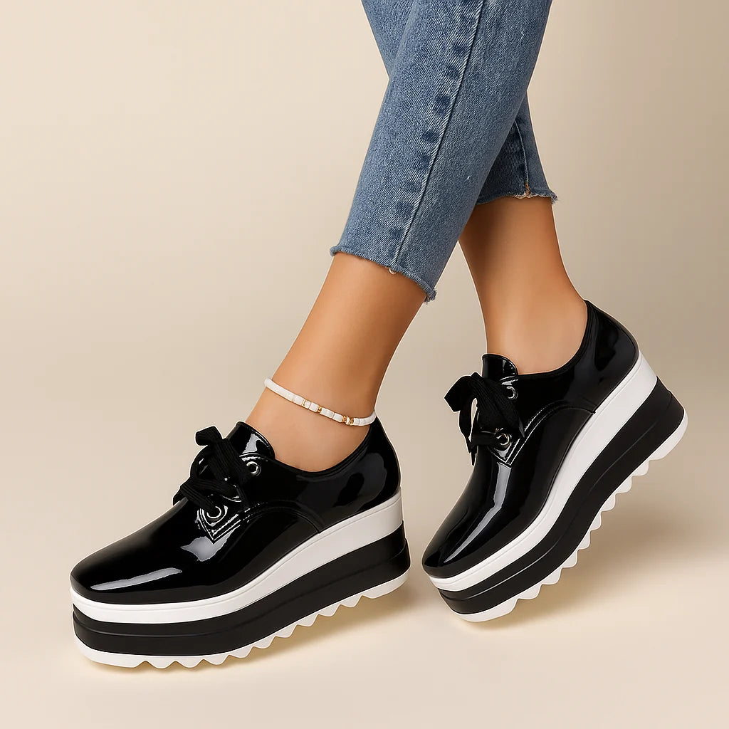 Women's Gloss-Finish Lace-Up Platform Sneakers in Black – Product view | Hensley London