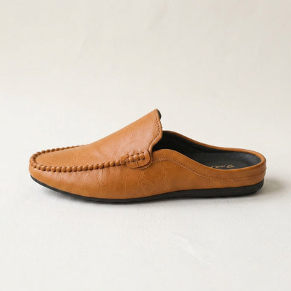 Men's Grained Leather Backless Mule Loafers in Brown – side view | Hensley London