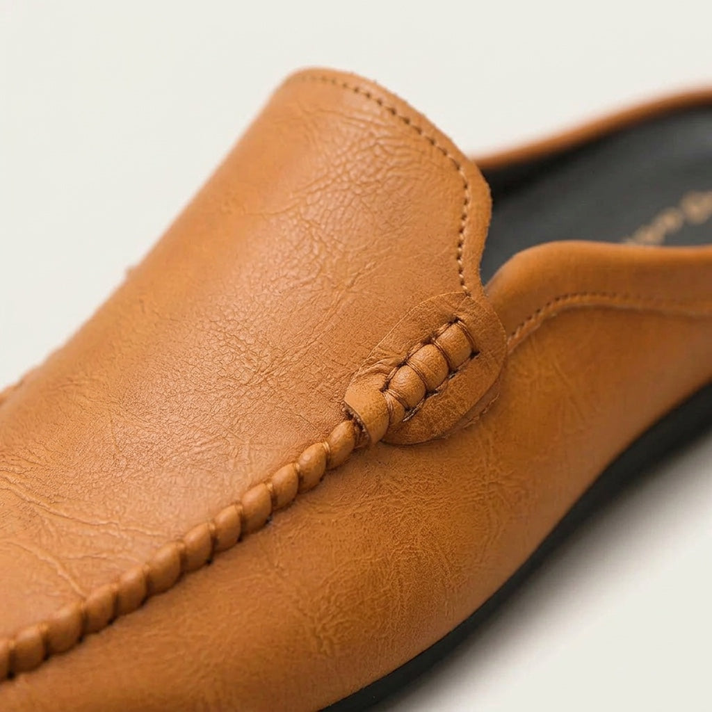 Men's Grained Leather Backless Mule Loafers in Brown – angled view | Hensley London