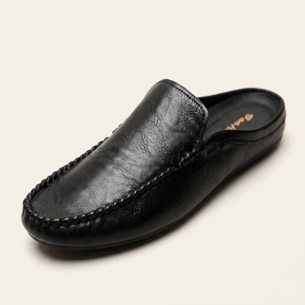 Men's Grained Leather Backless Mule Loafers in Black – detail view | Hensley London