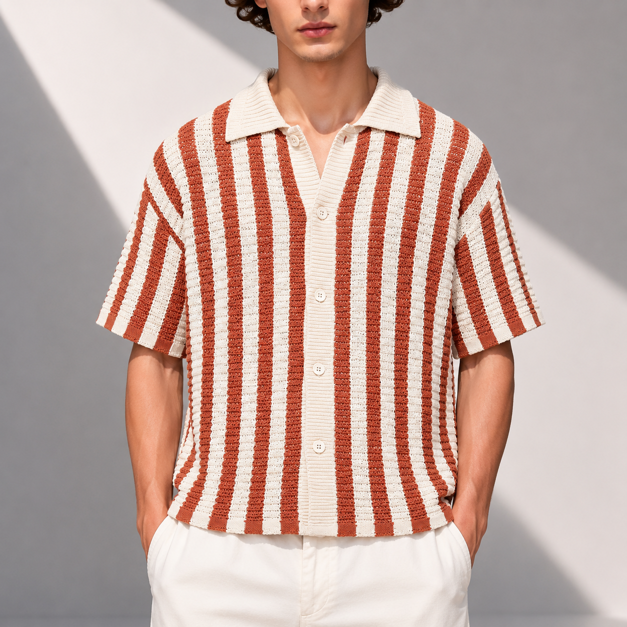 Men's Stripe Knit Polo Shirt in Orange - front view | Hensley London
