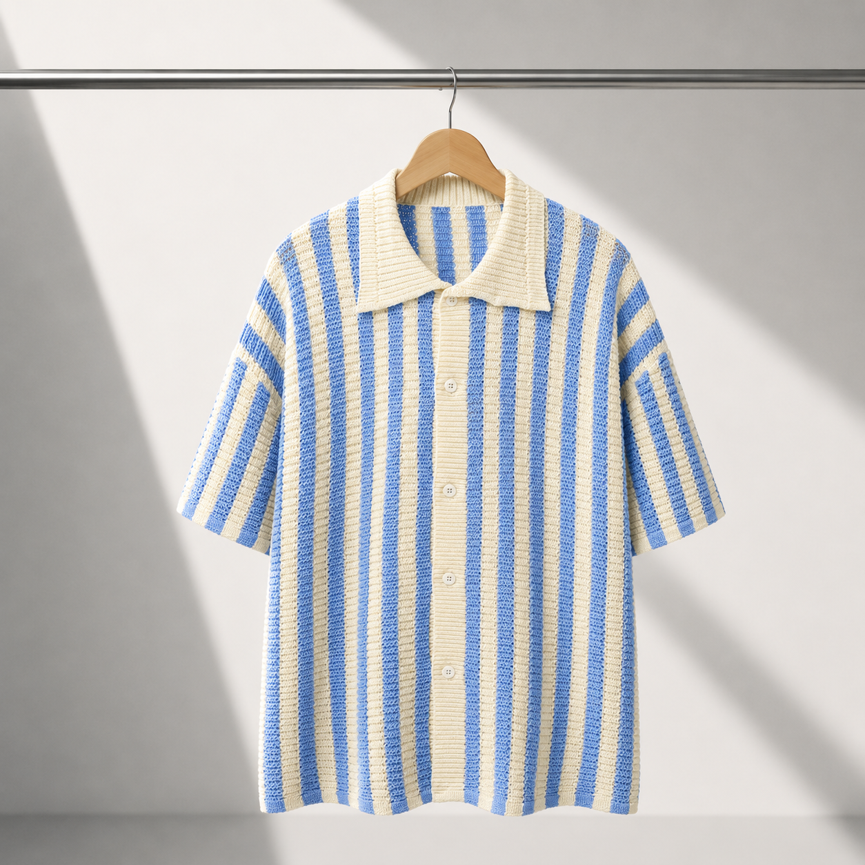 Men's Stripe Knit Polo Shirt in Blue - detail view | Hensley London