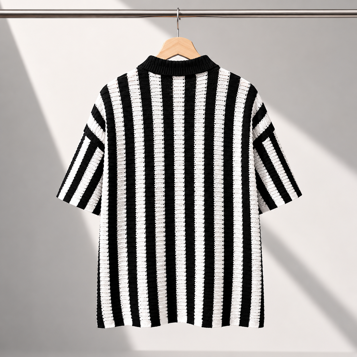 Men's Stripe Knit Polo Shirt in Black - back view | Hensley London