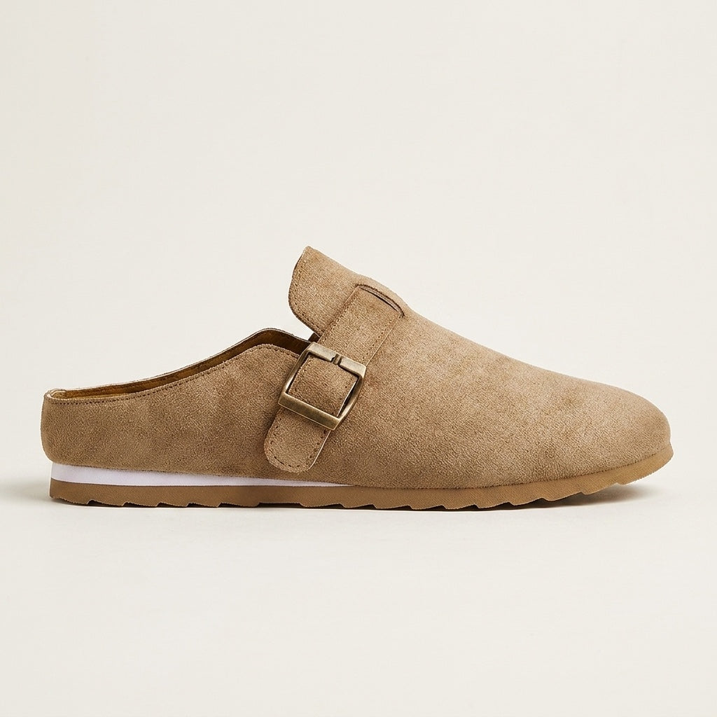 Women's Suede Buckle-Strap Mules in Sand – angled view | Hensley London