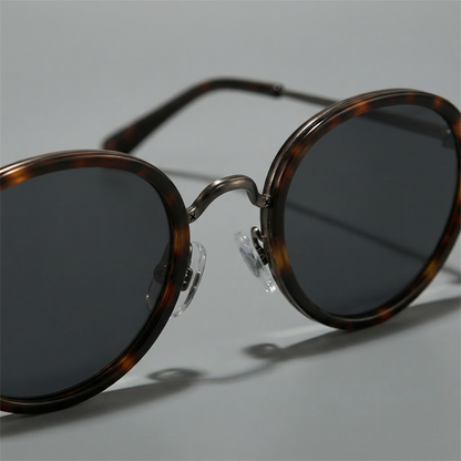 Men's Slim Metal Oval Retro Sunglasses in Tortoise – angled bridge detail | Hensley London
