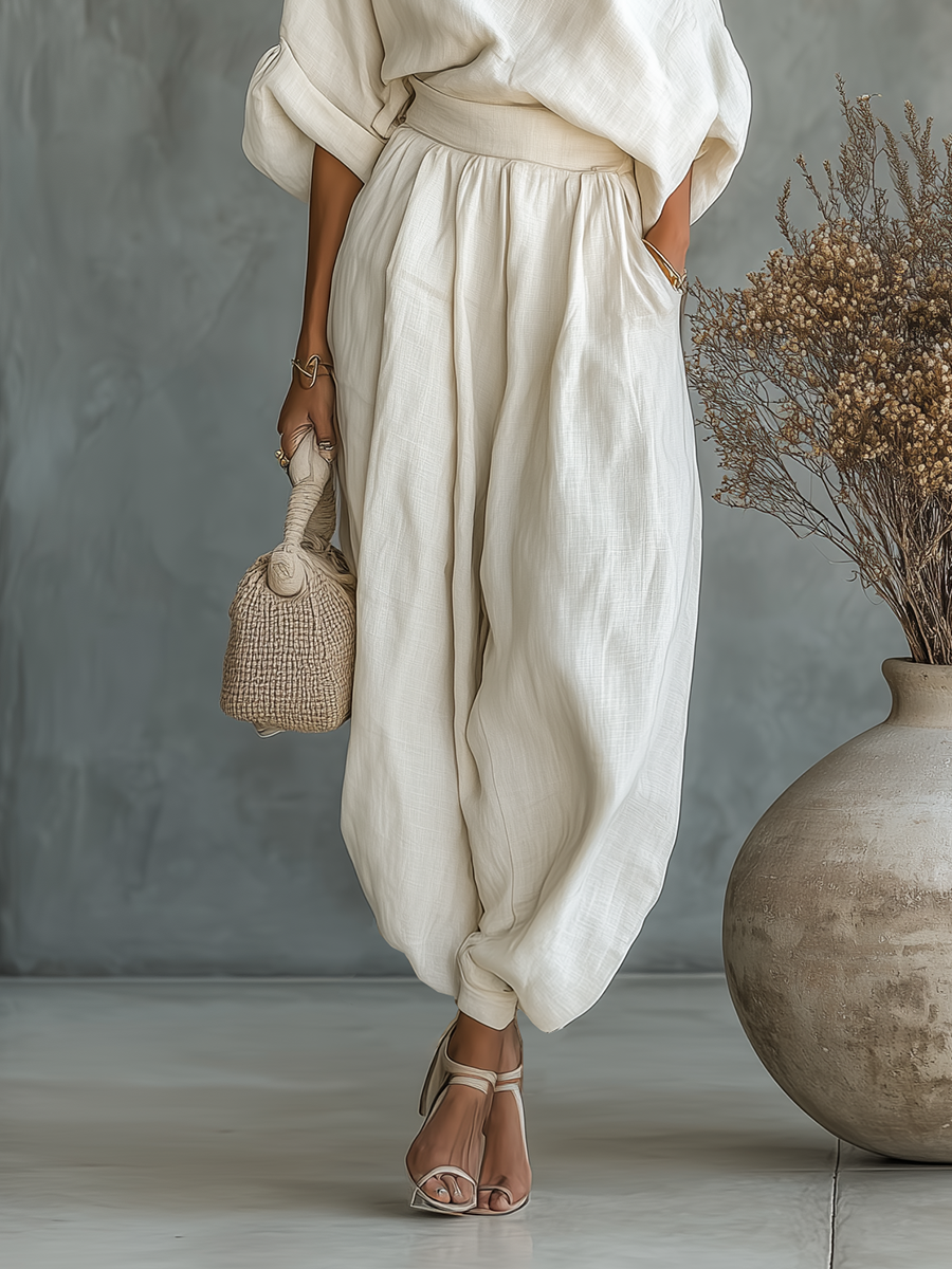 Women's Linen Off-Shoulder Top & Tapered Pants Set in Off-White – product view | Hensley London