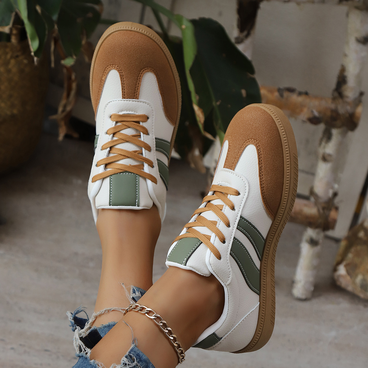 Women's Leather Retro Low-Top Sneakers in Black White – front view | Hensley London