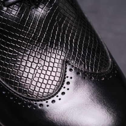 Men's Faux Leather Textured Wingtip Brogue Shoes in Black – wingtip texture close-up | Hensley London