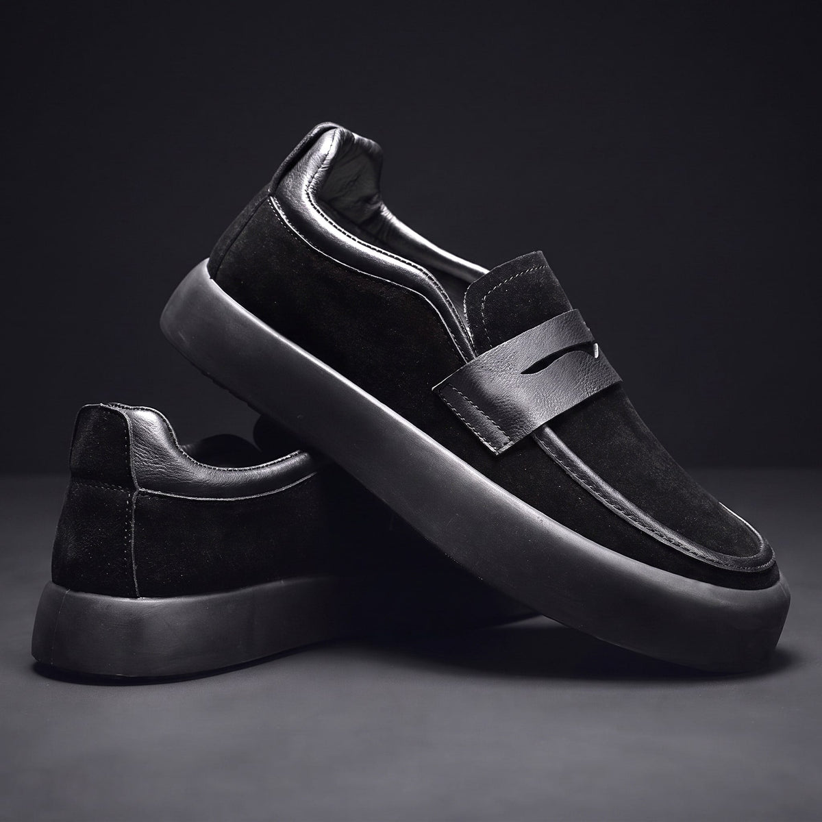 Men's Microsuede Penny Loafers with Chunky Sole in Black – three-quarter stacked pair | Hensley London