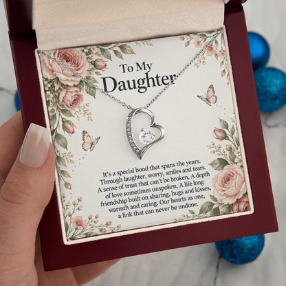 Gift for Daughter Forever Love Necklace in White Gold Finish – luxury box held in hand | Hensley London