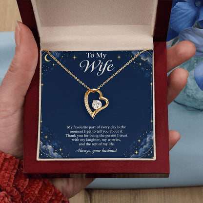 Yellow-gold Forever Love heart necklace and Wife message card in luxury box held upright | Hensley London