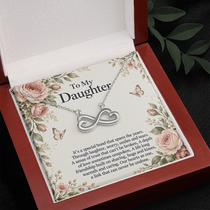 Gift for Daughter Endless Love Infinity Heart Necklace in white gold finish – luxury box and message card close-up | Hensley London