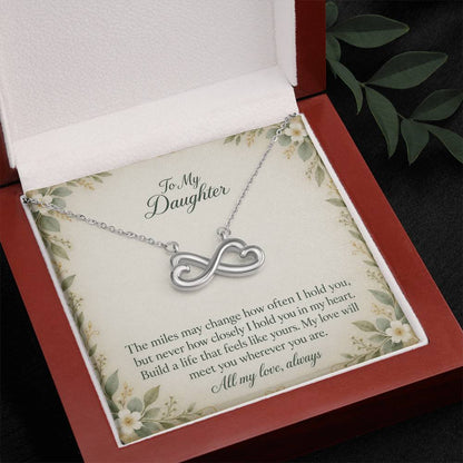 White-gold Endless Love infinity necklace and Daughter message card in open luxury box | Hensley London