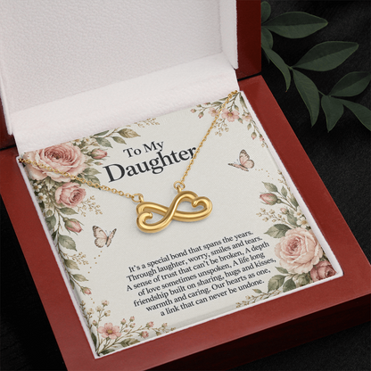 Gift for Daughter Endless Love Infinity Heart Necklace in yellow gold finish – luxury box and message card close-up | Hensley London