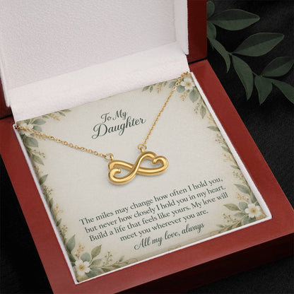 Yellow-gold Endless Love infinity necklace and Daughter message card in open luxury box | Hensley London