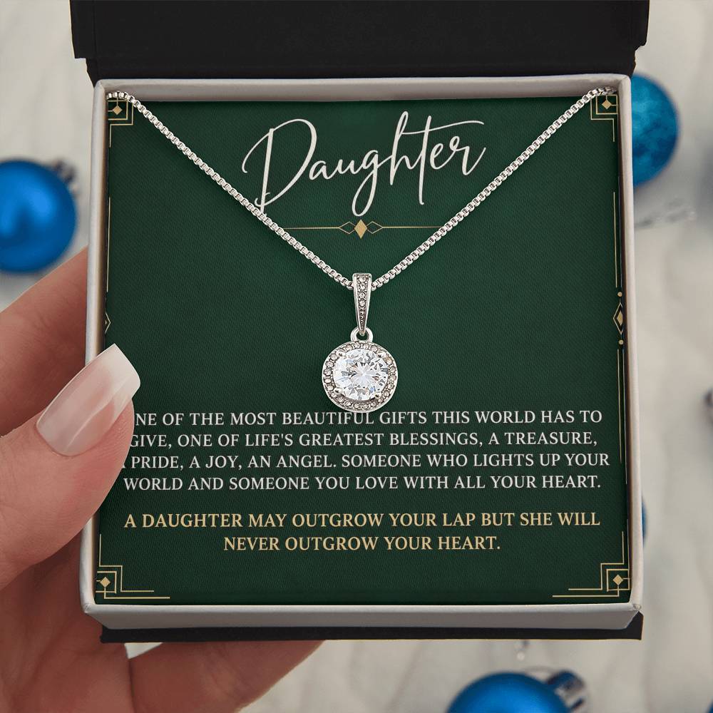 Eternal Hope Necklace with Emerald Art Deco daughter card – Two Tone Box held in hand | Hensley London