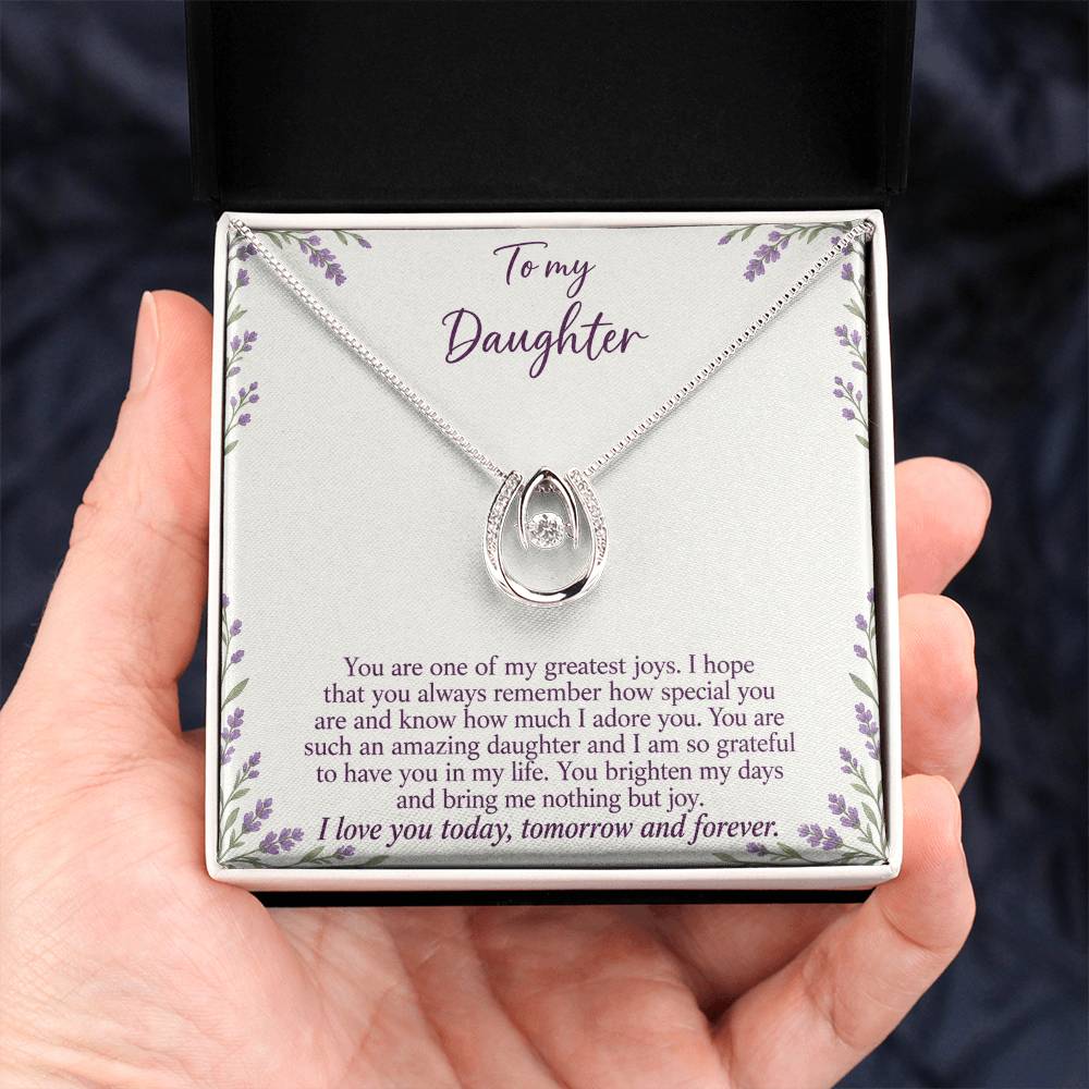 Lucky In Love teardrop necklace in white gold finish – Lavender Meadow Two Tone Box held in hand | Hensley London