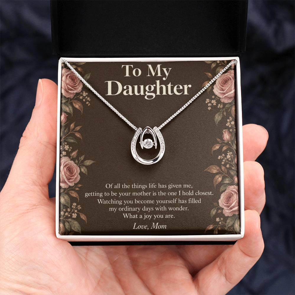 Lucky In Love necklace and rose-bordered Daughter message card in two-tone box held upright | Hensley London