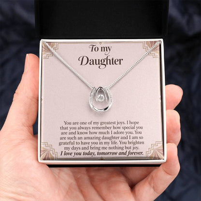 Lucky In Love teardrop necklace in white gold finish – Blush Art Deco Two Tone Box held in hand | Hensley London