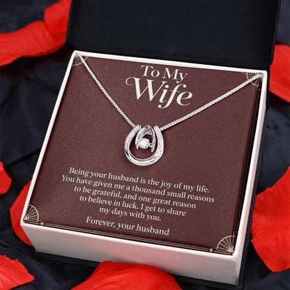 Lucky In Love necklace and Wife message card in two-tone box on dark fabric | Hensley London