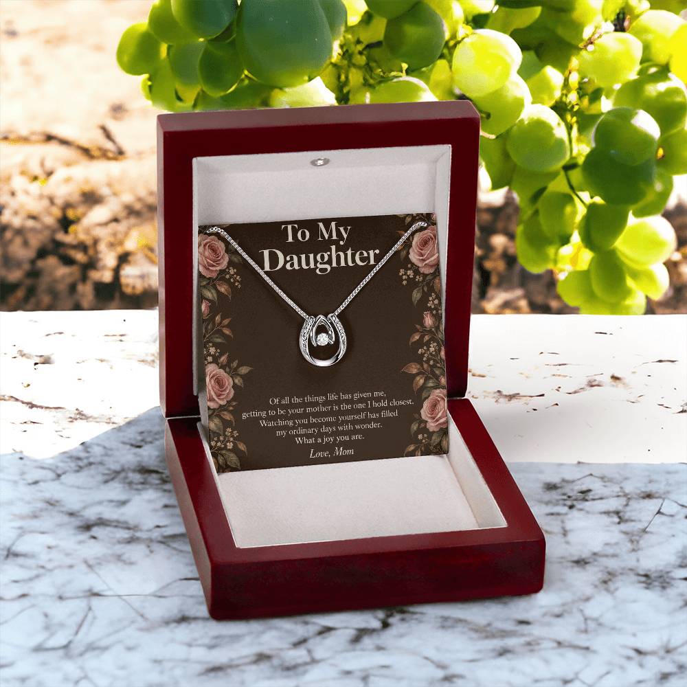 Lucky In Love necklace and Daughter message card in LED luxury box outdoors | Hensley London
