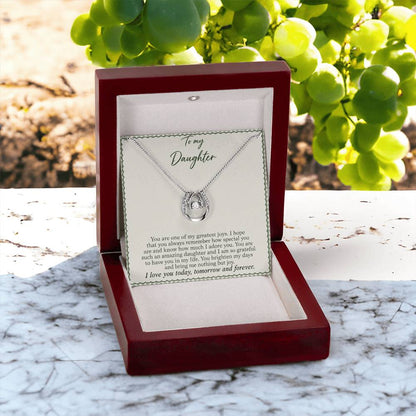 Lucky In Love teardrop necklace in white gold finish – Sage Gingham open Luxury Box outdoors | Hensley London