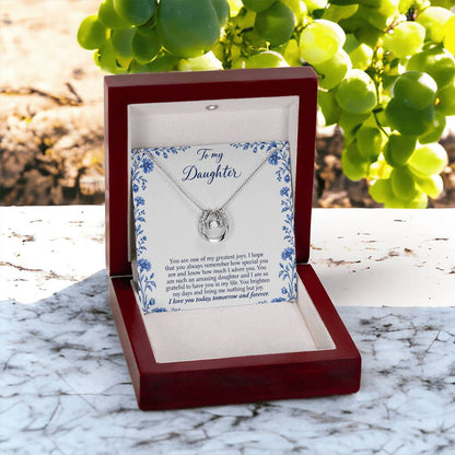 Lucky In Love teardrop necklace in white gold finish – Blue Porcelain open Luxury Box outdoors | Hensley London