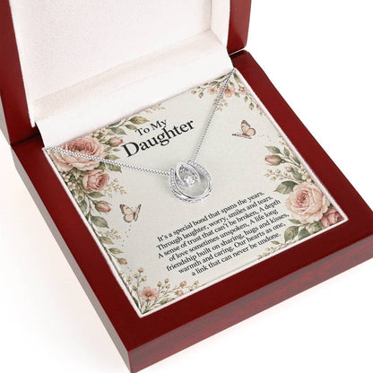 Lucky In Love teardrop necklace in white gold finish – Rose Botanical Luxury Box pendant close-up | Hensley London