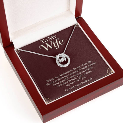 Lucky In Love necklace and Wife message card in open luxury box, angled view | Hensley London