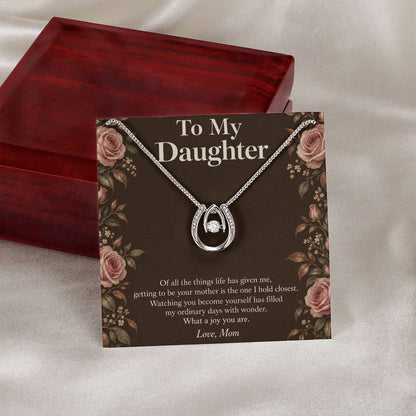 Lucky In Love necklace and Daughter message card beside closed luxury box | Hensley London